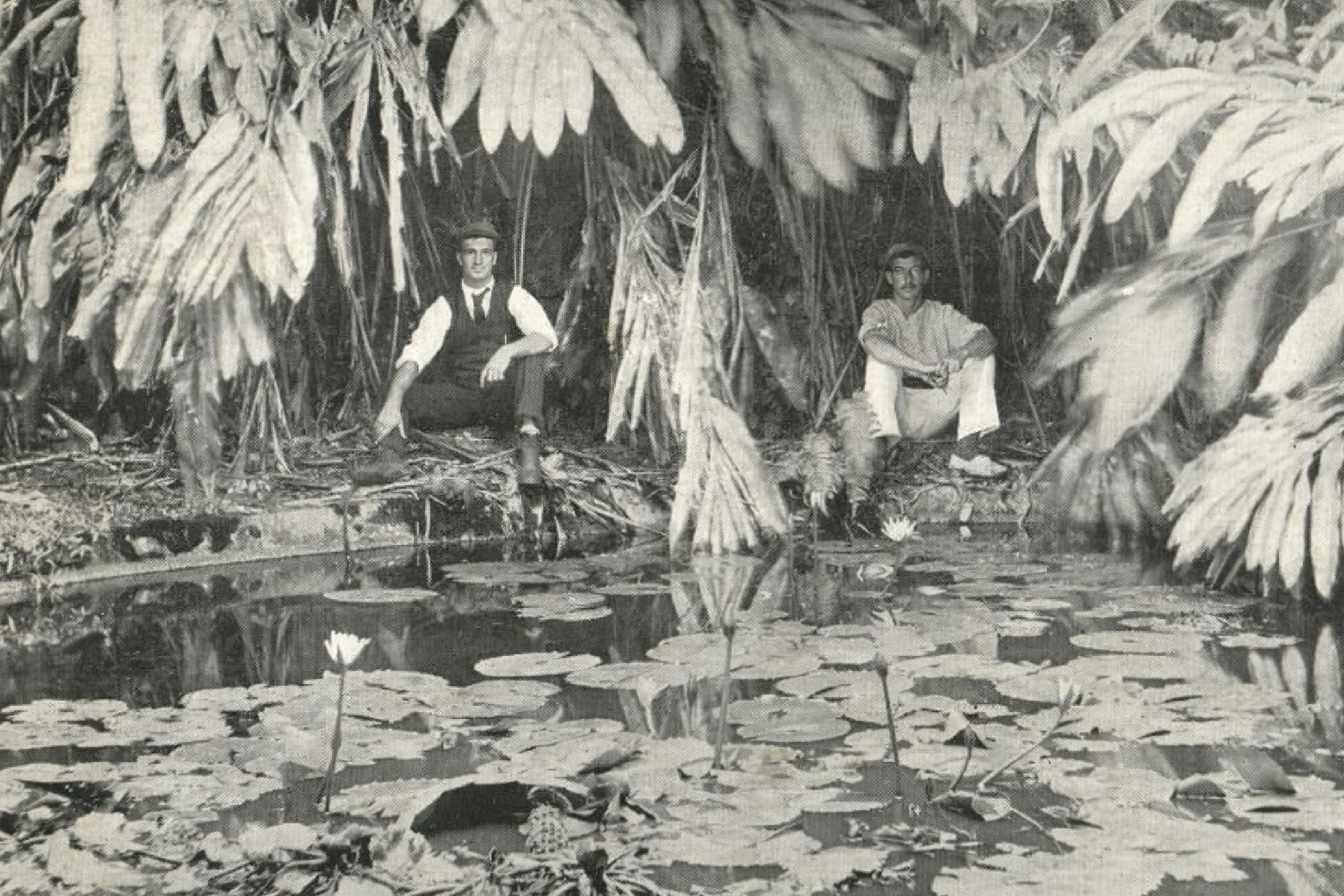 Photo of two men next to Dew Pond on Ascension Island