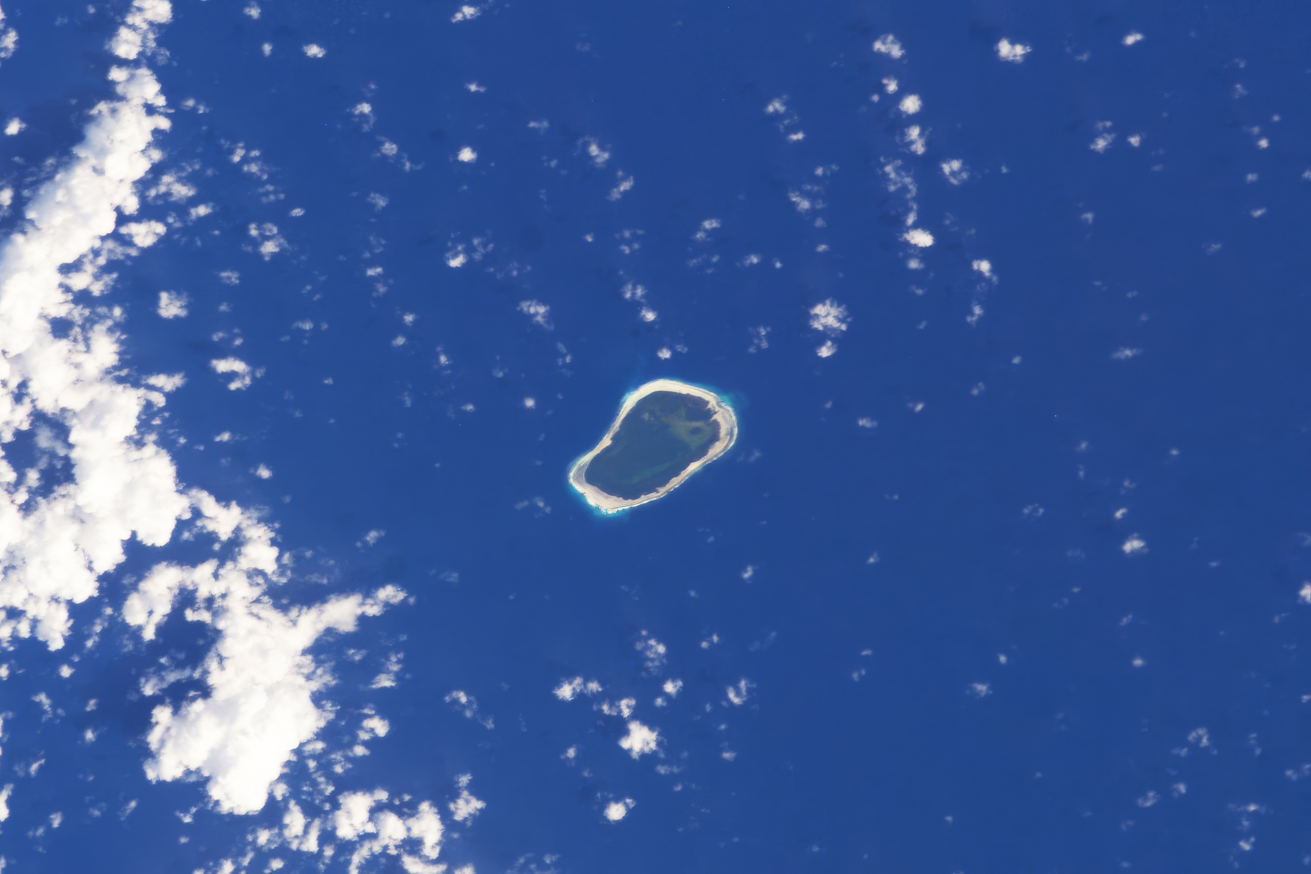 Aerial view of the Pacific Ocean and Clipperton Island taken from the ISS Expedition 8