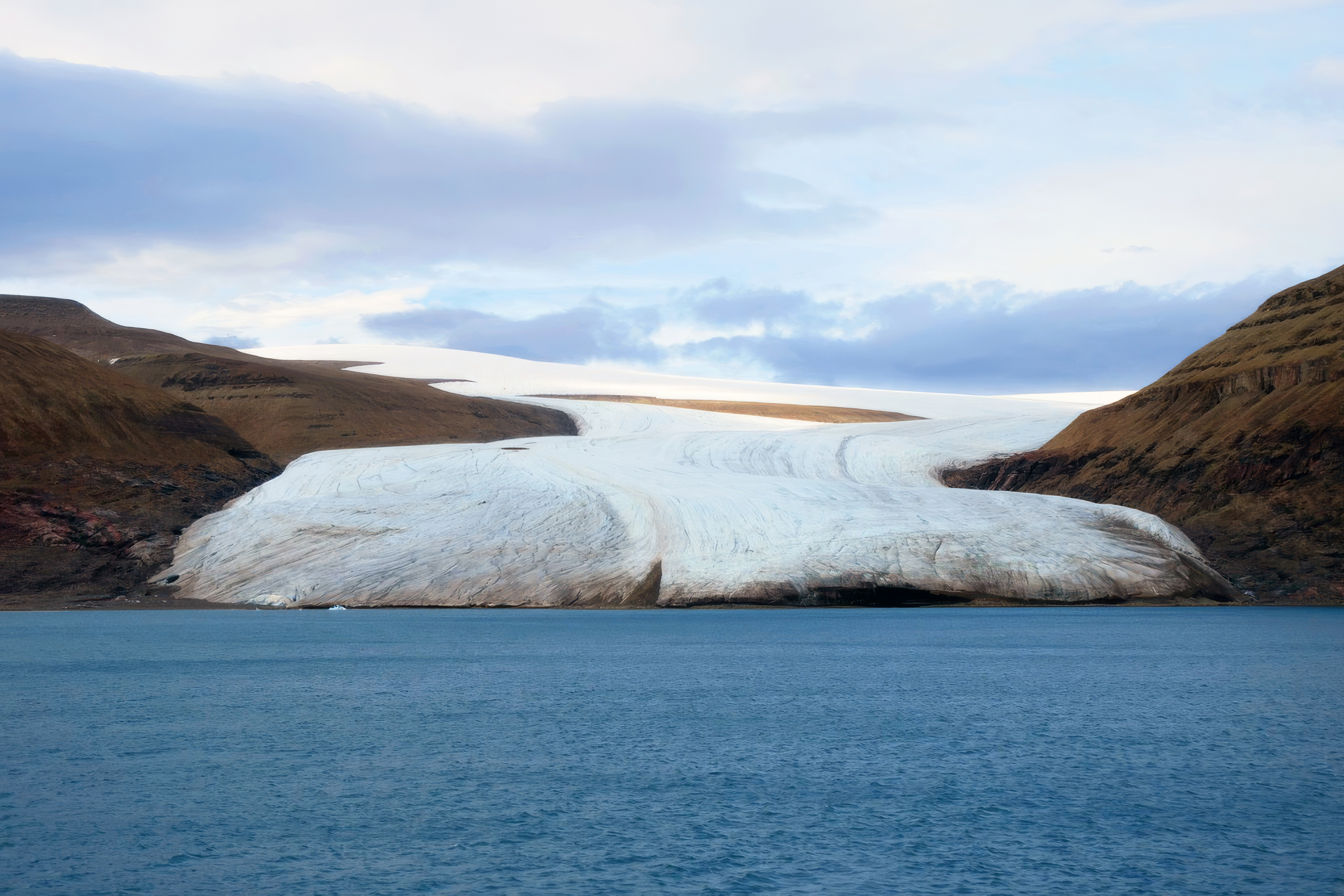 Large glacier flowing into Cuming Inlet on the southern coast of Devon Island